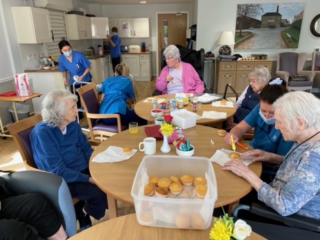 Residents Decorating Cupcakes