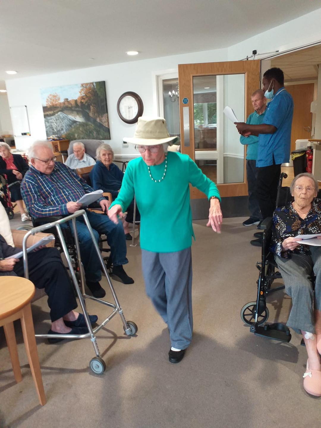 Residents Dancing and Singing to Music