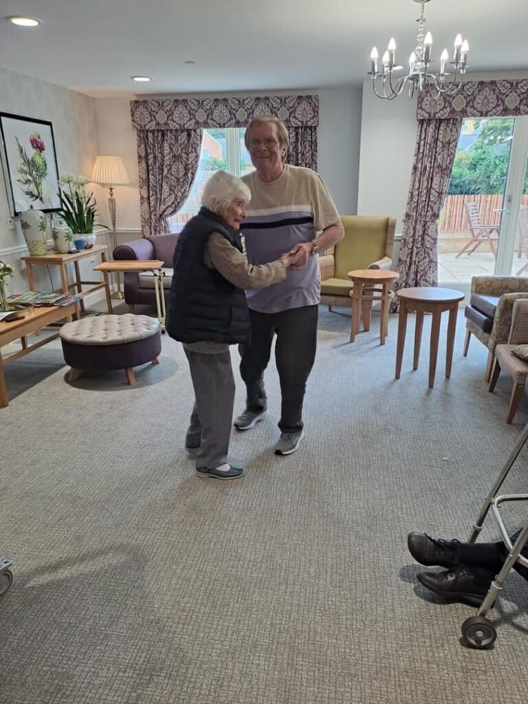 Residents Dancing in Living Area