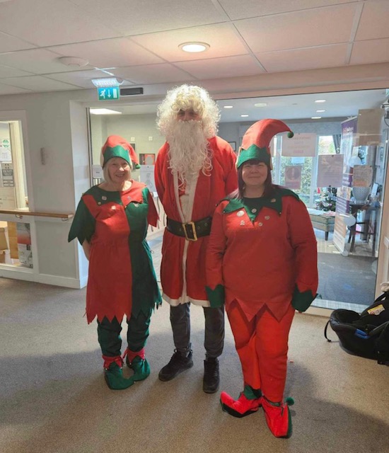 Santa with His Elves