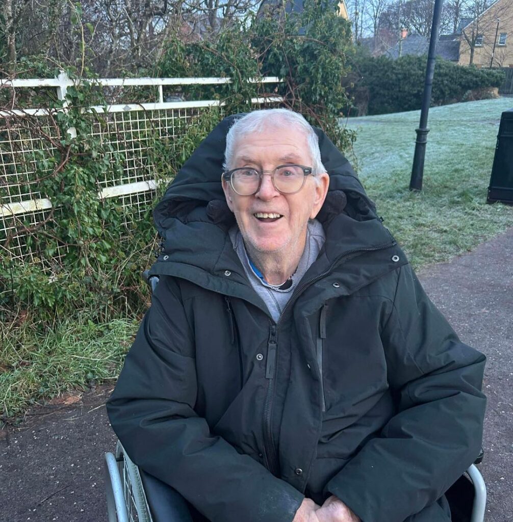 smiling resident outdoors