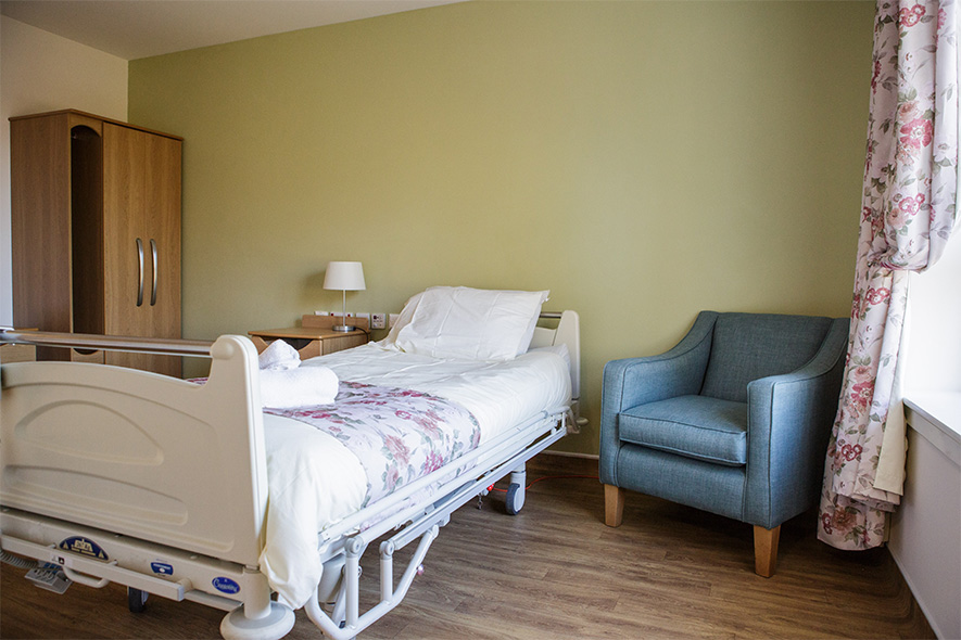 purple decorated bedroom in care home