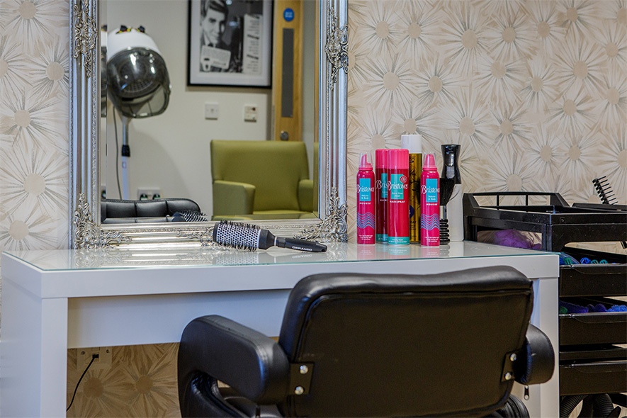 mirror and hair products in care home salon