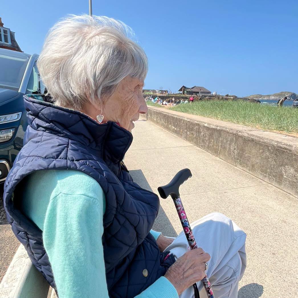 care home resident looking at the sea